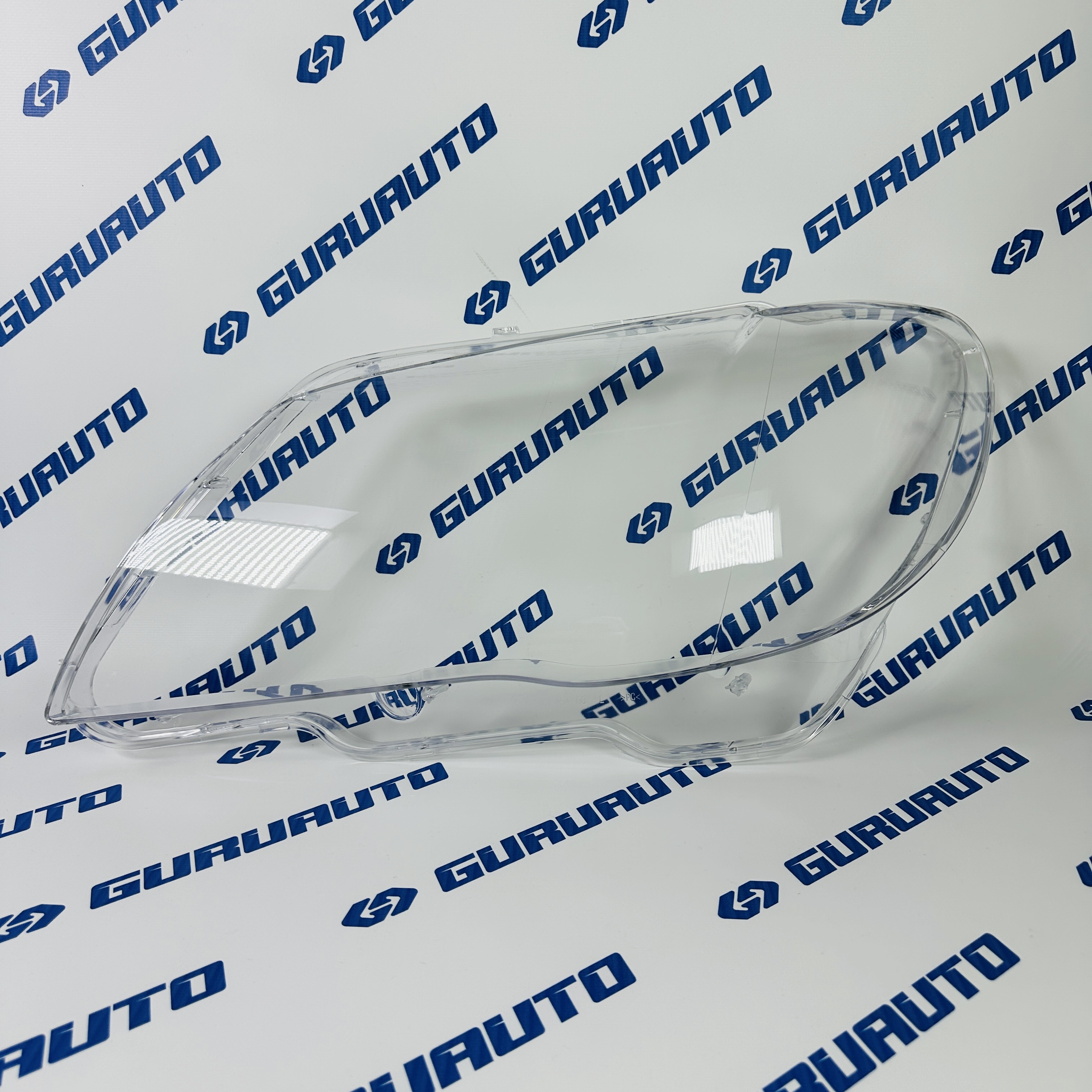 Стекло фары левой BMW E66 (2006-2008)