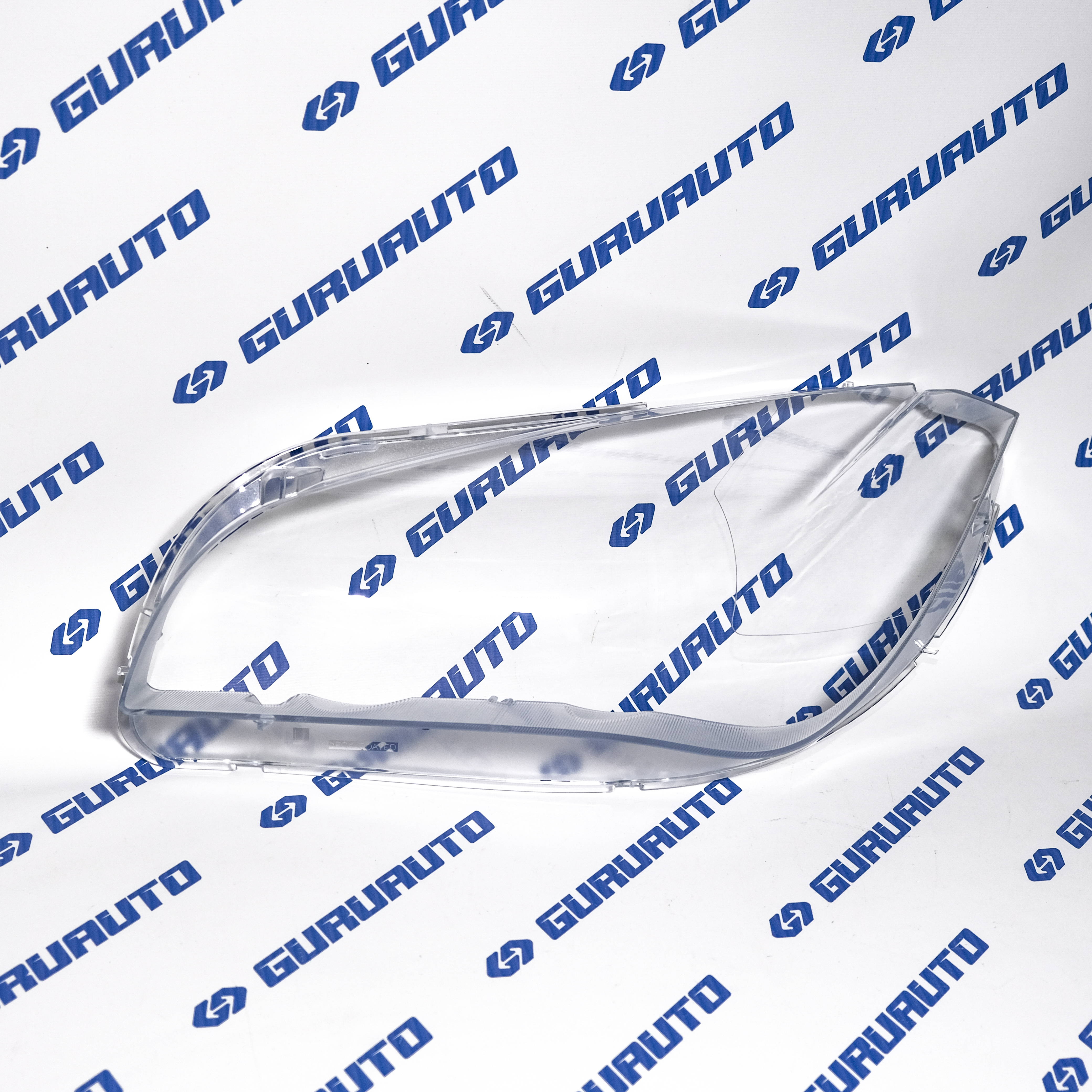 Стекло фары левой BMW E84 (2009-2015)